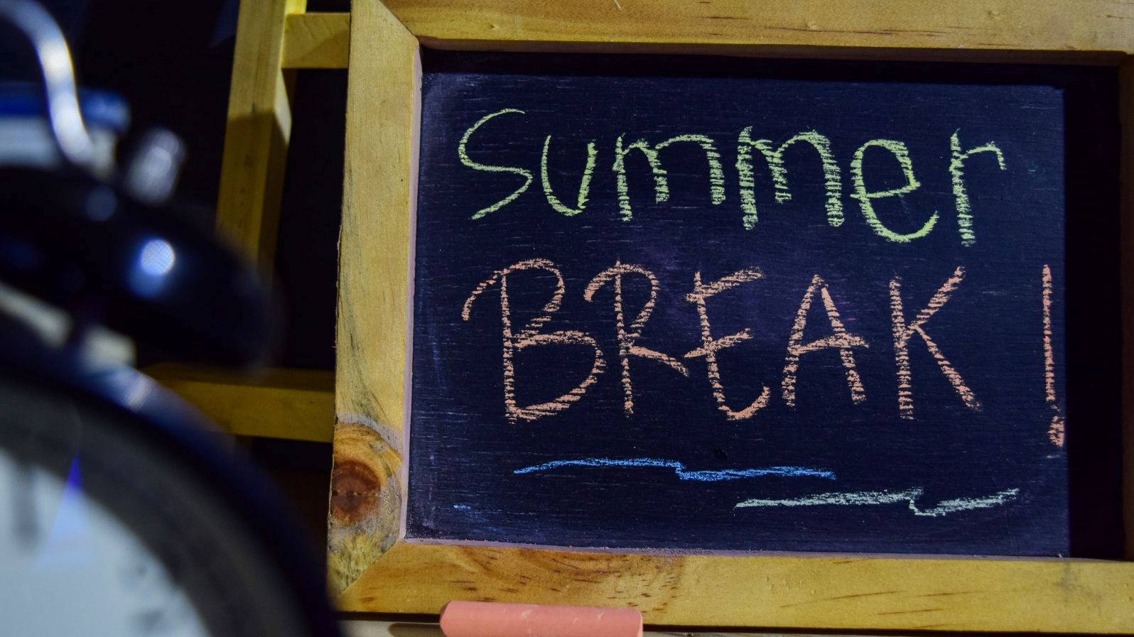 Chalkboard with Summer Break written on it.